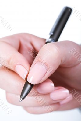Hand with pen