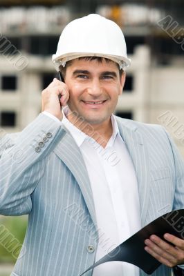 Businessman with helmet