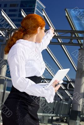 confident businesswoman in the city