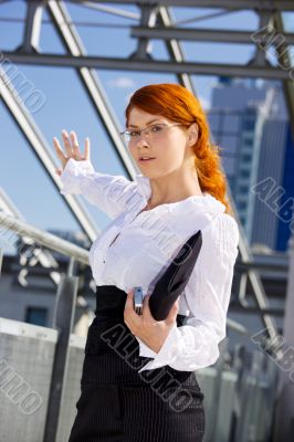 businesswoman in a front of a building site