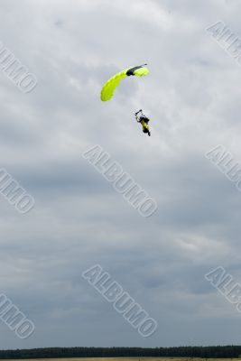 Landing of the sportsman after parachute jump