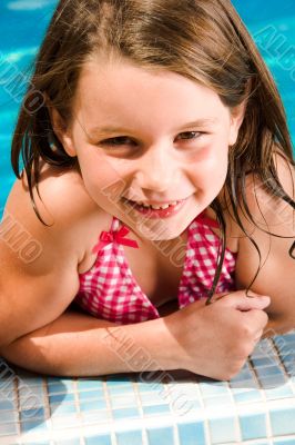 Summer child is looking into the lens