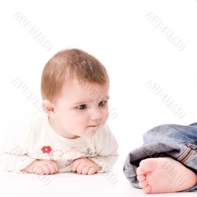 Baby is fee tlooking