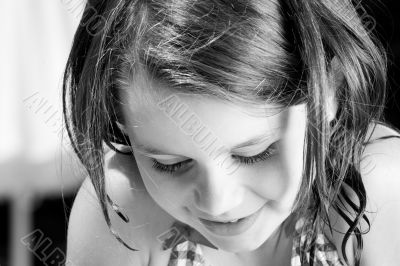 Summer child looking down