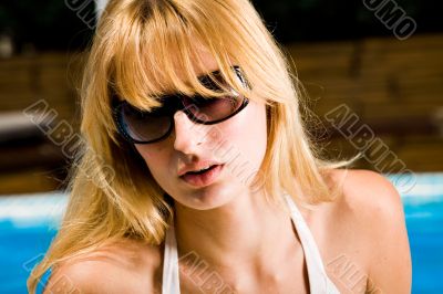 Summer portrait of a blond girl