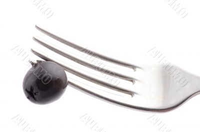 fork with black olive