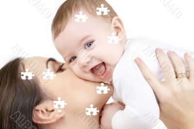 puzzle of laughing baby playing with mother