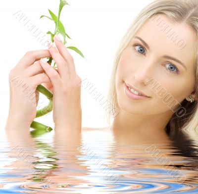 happy blonde with bamboo