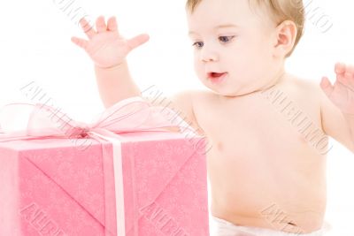 baby boy with gift box