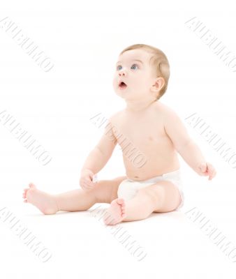 baby boy in diaper with toothbrush