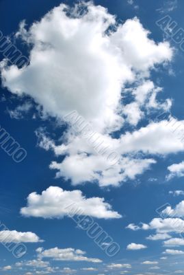 day blue sky with white fluffy clouds