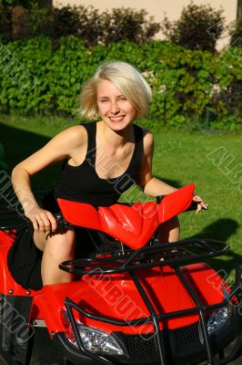 young lady on the all-terrain vehicle