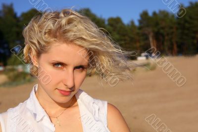 Portrait of a beautiful young in the beach