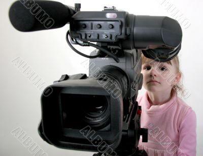girl look in the camcorder