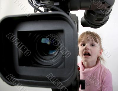 girl look in the camcorder