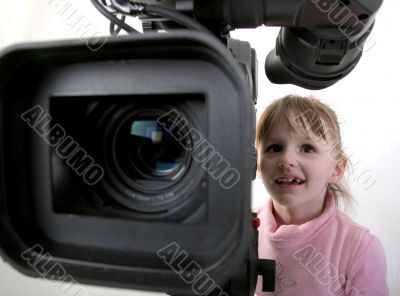 girl look in the camcorder