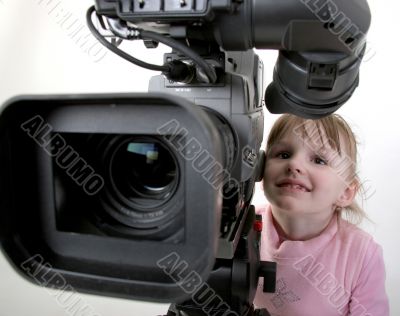 girl look in the camcorder