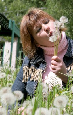 woman and dandelion