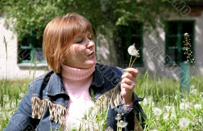 woman and dandelion