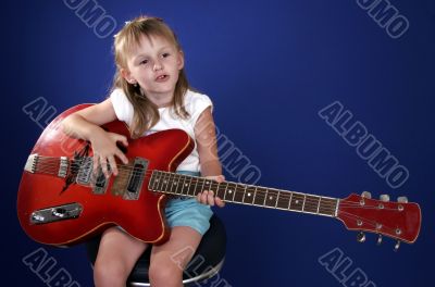 little girl and guitar