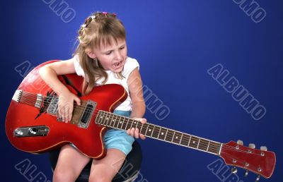 little girl and guitar