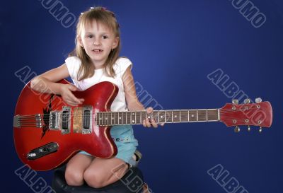 little girl and guitar