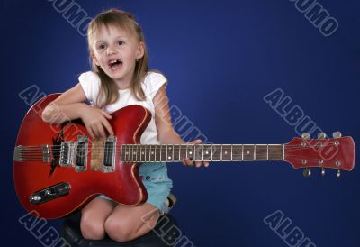 little girl and guitar
