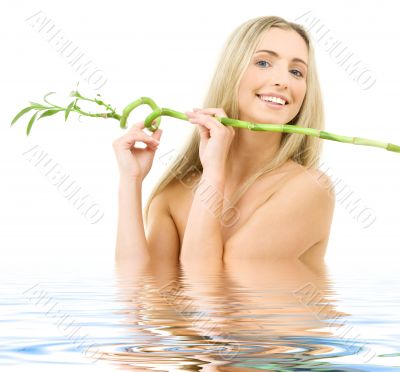 happy blonde with bamboo