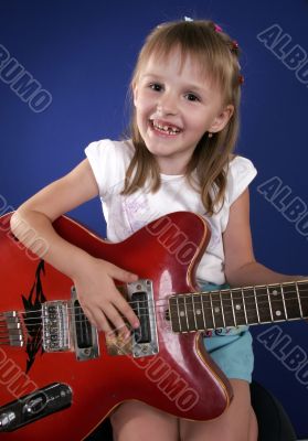 little girl and guitar