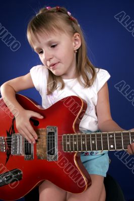 little girl and guitar
