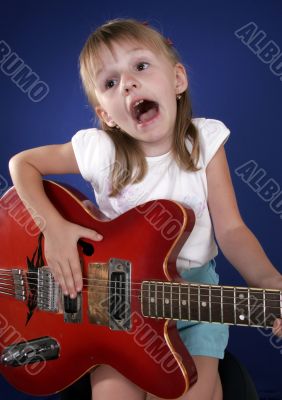 little girl and guitar
