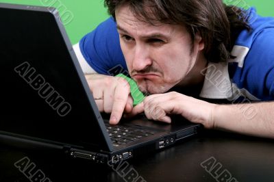 man work with laptop