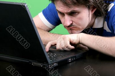 man work with laptop