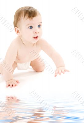 crawling baby boy in diaper