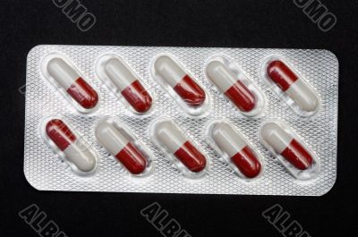 Pills in plastic container
