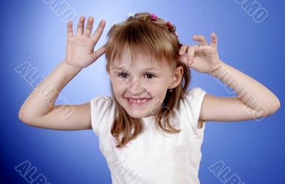 little girl make faces
