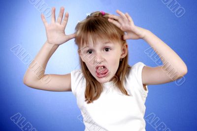 little girl make faces