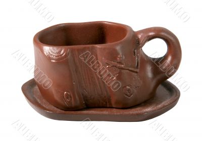 isolated clay cup for tea