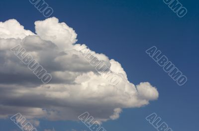 Puffy Clouds on a blue sky.