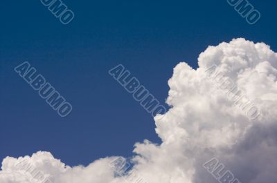 Puffy Clouds on a blue sky.