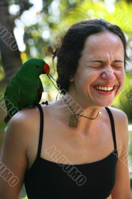 Girl with a green parrot