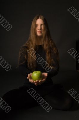Woman with green apple