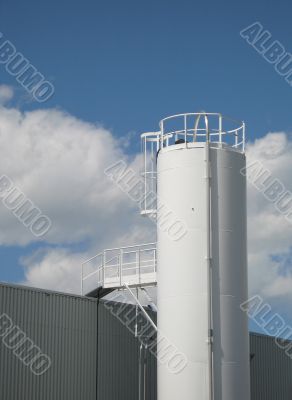 white tall industrial silo