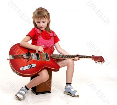 little girl and guitar