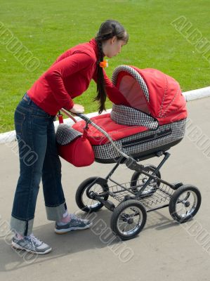 Woman with baby carriage