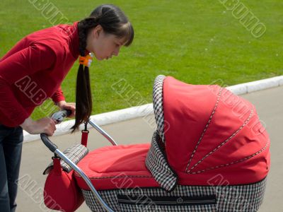 Woman with baby carriage