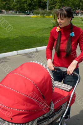 Woman with baby carriage