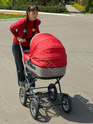 Woman with baby carriage
