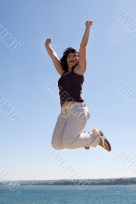 Beautiful girl jumping