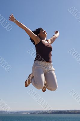 Beautiful girl jumping
